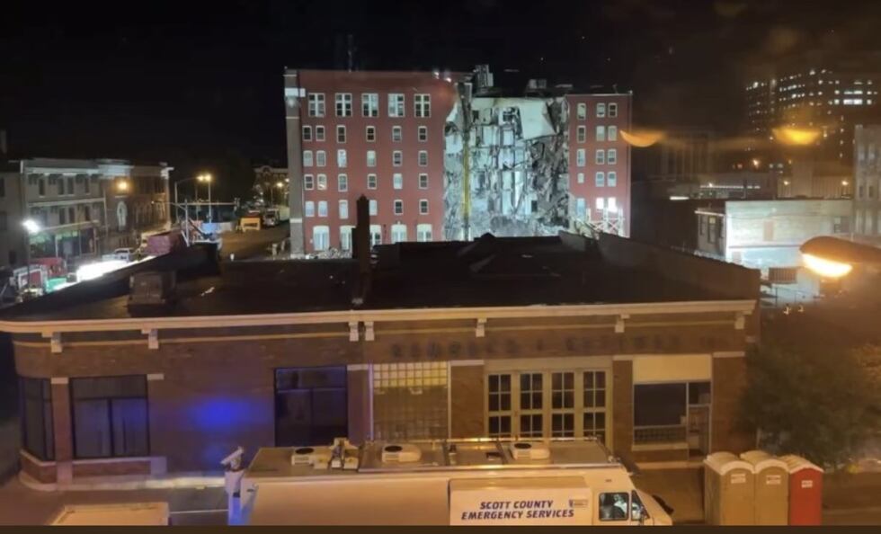 Recover crews working on deconstruction of the partially collapsed building