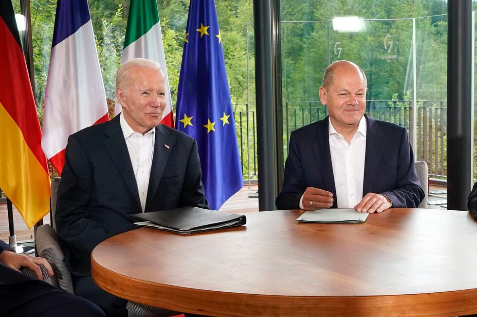 FILE - President Joe Biden and German Chancellor Olaf Scholz meet on the sidelines of the G7...