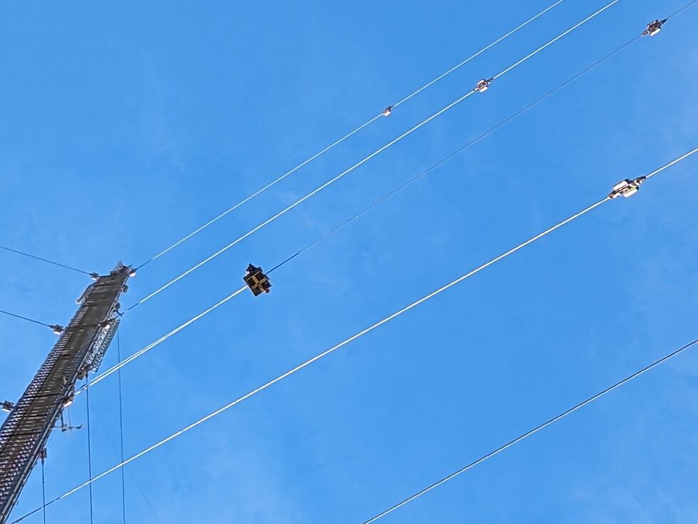 The basket traveling down the north third guy from the tower top, from the KWQC tower work. It...
