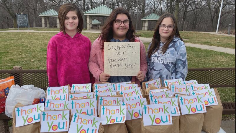 A group of girls handed out thank you bags full of food to truck drivers at an I-80 rest stop...