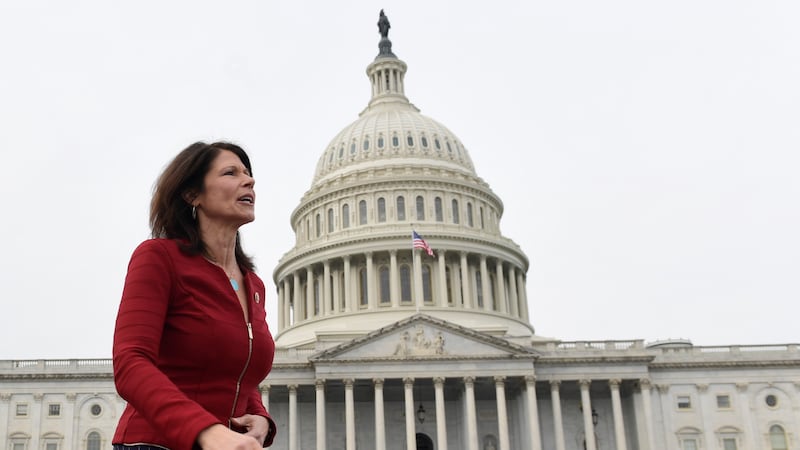 FILE - In this Jan. 4, 2019 file photo, Rep. Cheri Bustos, D-Ill., walks to a group photo with...